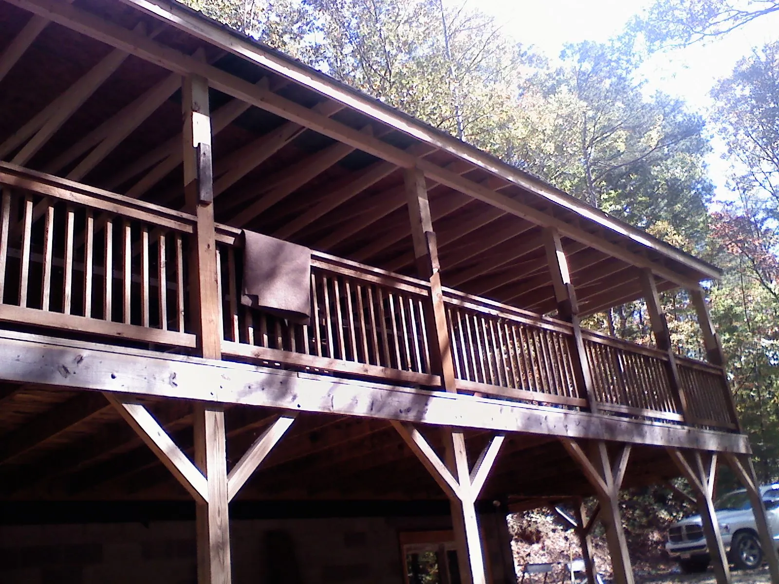 Timber framing under a new elevated porch and deck — Roof Leak Repair in Milton Mills by Roofing Brothers